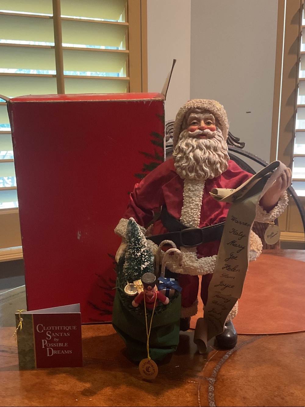 Possible Dreams “Santa’s grab bag” Classic Red and Cream Santa Holiday Figurine